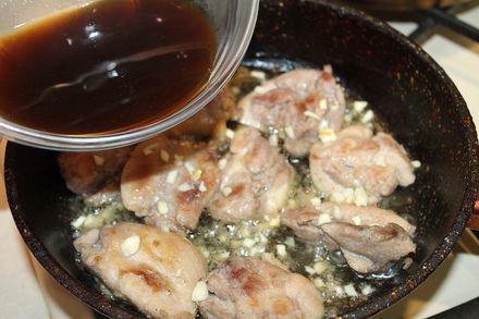 Sour sweet chicken in soy sauce with honey and garlic