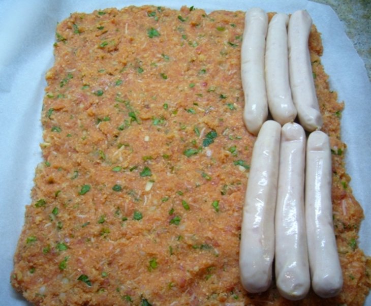 Meatloaf with sausages and potatoes