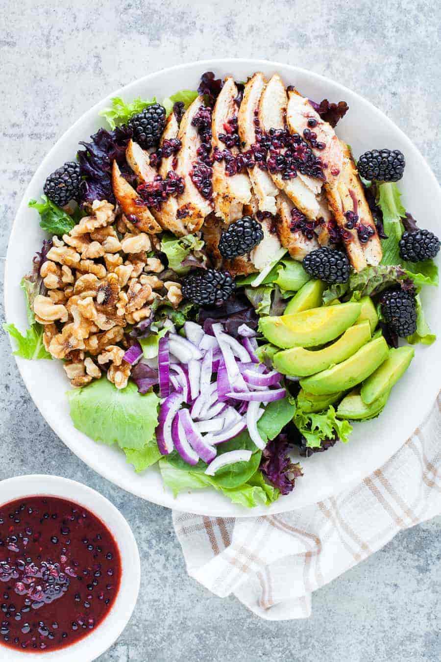 Incredibly delicious and healthy chicken salad with blackberries, avocado and walnuts