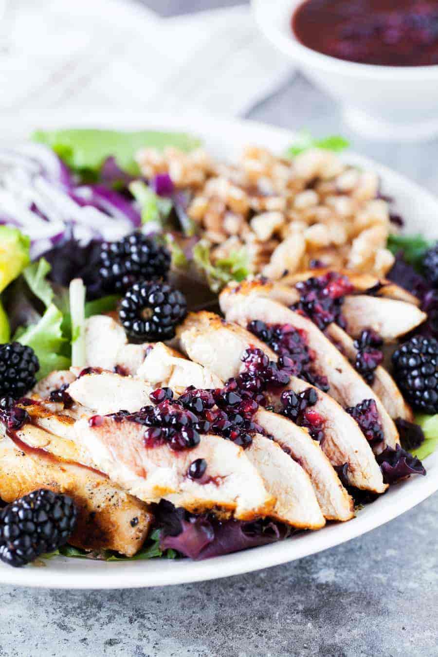 Incredibly delicious and healthy chicken salad with blackberries, avocado and walnuts