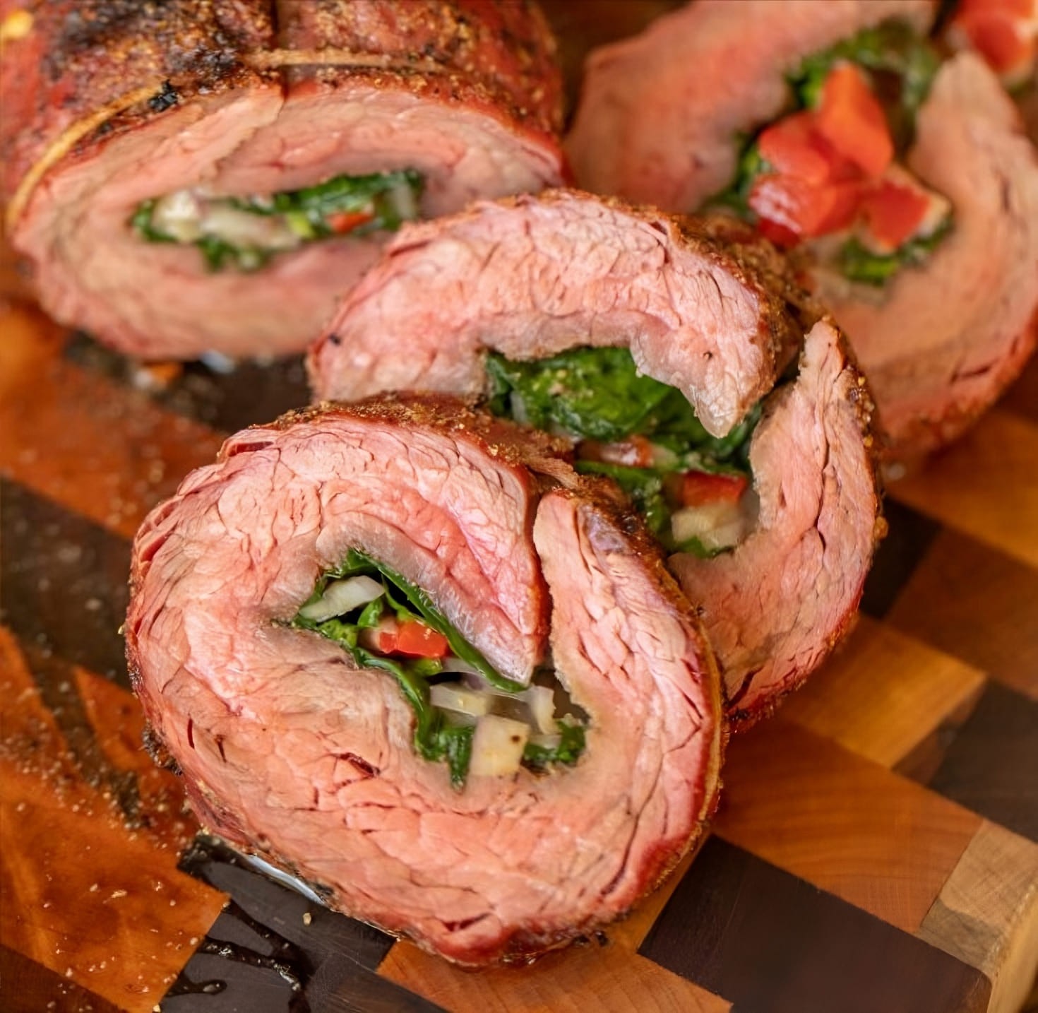 A Flavorful Twist: Stuffed Flank Steak with Spinach, Peppers, and Cheese